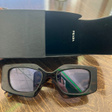 Солнцезащитные очки • Prada Eyewear • Мульти